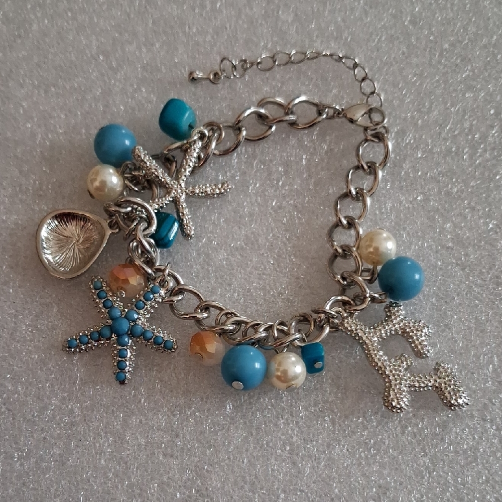 Silver Charm Bracelet with Blue Accents